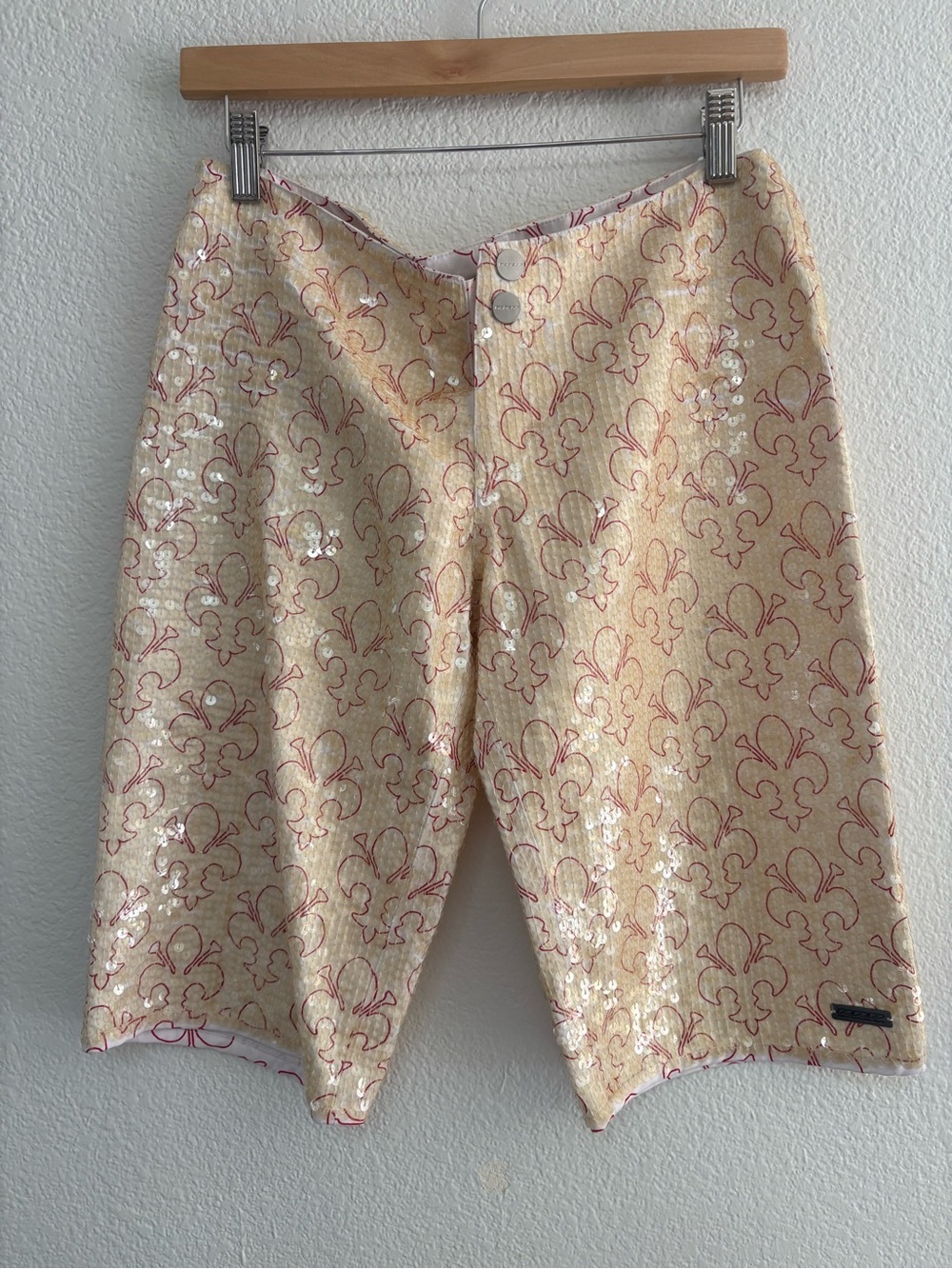 Sequin-Embellished Cream Bermuda Shorts with Pink Motif